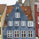 painted-blue-old-building-with-orange-roof (1)